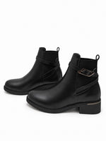 Paire de bottines Chelsea noires à brides croisées et boucle métallique