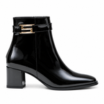 Bottines élégantes avec boucle dorée – vue de profil sur fond blanc